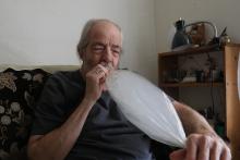 Madison resident Gary Storck inhales marijuana vapor to treat glaucoma in his apartment on March 20, 2019. Storck says he believes cannabis legalization won't happen in Wisconsin under current Republican control at the state Capitol. Coburn Dukehart/Wisco